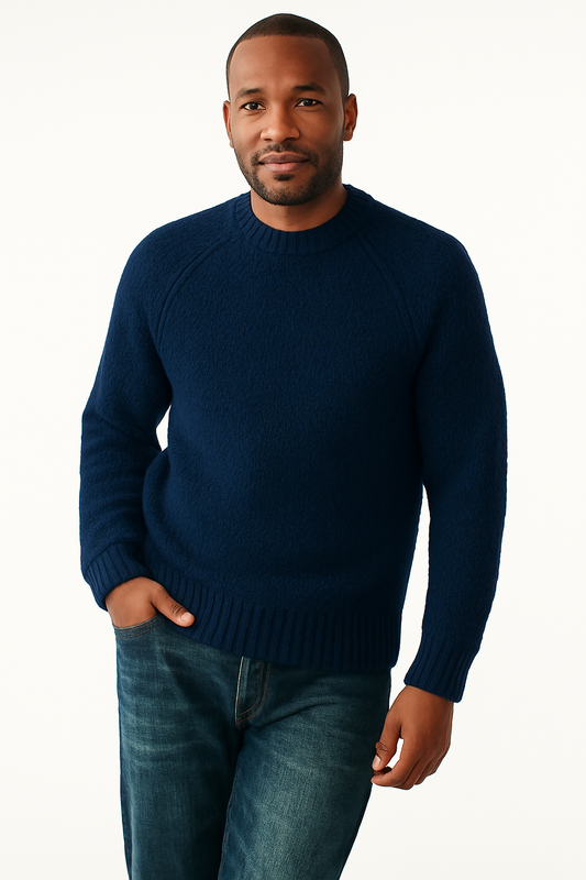 Men’s pullover sweater in navy blue with classic round neck, soft knitted fabric, worn with jeans for casual winter style